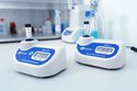 Biosan DEN-1 and DEN-1B McFarland densitometers two units one beside another on a lab desk