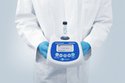 Biosan DEN-600 photometer holded in hands